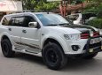 Mitsubishi Pajero Sport G 4x4 2014 - Cần bán xe Mitsubishi Pajero Sport G 4x4 sản xuất 2014, màu trắng chính chủ