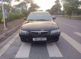 Mazda 626   2002 - Cần bán xe Mazda 626 sản xuất năm 2002, màu đen, 135tr