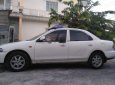 Mazda 323 1999 - Cần bán gấp Mazda 323 sản xuất năm 1999, màu trắng, nhập khẩu