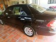 Mazda 626 1999 - Cần bán Mazda 626 đời 1999, màu đen, xe nhập chính chủ, giá 165tr