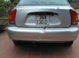 Daewoo Lanos SX 2004 - Bán ô tô Daewoo Lanos SX sản xuất năm 2004, màu bạc