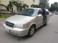 Kia Carnival  AT 2009 - Cần bán Kia Carnival AT năm sản xuất 2009, màu bạc, số tự động