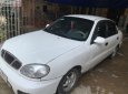 Daewoo Lanos SX 2002 - Cần bán gấp Daewoo Lanos SX đời 2002, màu trắng số sàn