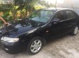 Mazda 626 1.6 2004 - Xe cũ Mazda 626 1.6 sản xuất năm 2004, màu đen, nhập khẩu  