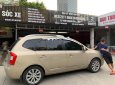 Kia Carens SXAT 2011 - Bán Kia Carens SXAT năm 2011, màu vàng chính chủ