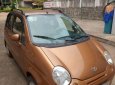 Daewoo Matiz 2004 - Gia đình bán ô tô Daewoo Matiz năm sản xuất 2004, màu nâu 