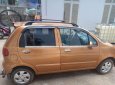 Daewoo Matiz 2004 - Gia đình bán ô tô Daewoo Matiz năm sản xuất 2004, màu nâu 