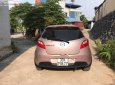 Mazda 2 2014 - Bán xe Mazda 2 năm 2014, màu hồng ít sử dụng