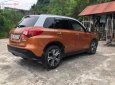 Suzuki Vitara   2016 - Bán Suzuki Vitara 1.6 AT sản xuất năm 2016, màu vàng, nhập khẩu  