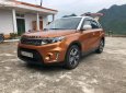 Suzuki Vitara   2016 - Bán Suzuki Vitara 1.6 AT sản xuất năm 2016, màu vàng, nhập khẩu  