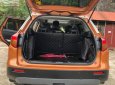 Suzuki Vitara   2016 - Bán Suzuki Vitara 1.6 AT sản xuất năm 2016, màu vàng, nhập khẩu  