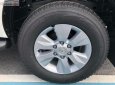 Toyota Hilux 2019 - Bán Toyota Hilux 2.4E 4x2 AT năm sản xuất 2019, màu trắng, xe nhập