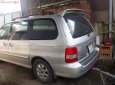 Kia Carnival GS 2.5 MT 2006 - Bán Kia Carnival GS 2.5 MT 2006, màu bạc xe gia đình