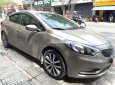 Kia K3 2014 - Cần bán xe Kia K3 năm 2014, màu vàng