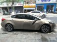 Kia K3 2014 - Bán Kia K3 sản xuất năm 2014, màu vàng số tự động, giá 482tr