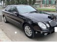 Mercedes-Benz E class 2002 - Bán Mercedes đời 2002, màu đen