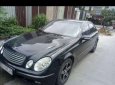 Mercedes-Benz E class 2002 - Bán Mercedes đời 2002, màu đen