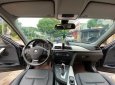 BMW 3 Series 2014 - Bán xe BMW 3 Series 320i đời 2014, màu đen