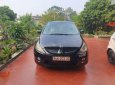 Mitsubishi Grandis 2006 - Bán xe Mitsubishi Grandis 2006, màu đen số tự động, giá tốt