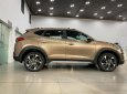 Hyundai Tucson 1.6 Turbo 2019 - Bán xe Hyundai Tucson 1.6 Turbo đời 2019, màu vàng