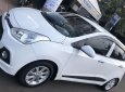 Hyundai Grand i10    AT 2016 - Bán Hyundai Grand i10 AT năm sản xuất 2016, màu trắng, xe nhập