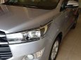 Toyota Innova 2016 - Cần bán lại xe Toyota Innova 2.0E 2016, màu bạc số sàn, giá tốt