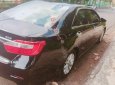 Toyota Camry 2013 - Cần bán gấp Toyota Camry 2.0E năm 2013, màu đen