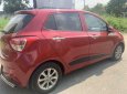 Hyundai Grand i10 2016 - Cần bán gấp Hyundai Grand i10 1.2 sản xuất 2016, màu đỏ, xe nhập xe gia đình, giá tốt