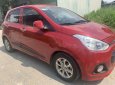 Hyundai Grand i10 2016 - Cần bán gấp Hyundai Grand i10 1.2 sản xuất 2016, màu đỏ, xe nhập xe gia đình, giá tốt