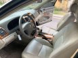 Toyota Camry 2003 - Cần bán gấp Toyota Camry đời 2003, màu đen số sàn, 258tr