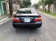 Toyota Camry 2003 - Cần bán gấp Toyota Camry đời 2003, màu đen số sàn, 258tr