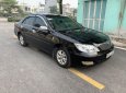 Toyota Camry 2003 - Cần bán gấp Toyota Camry đời 2003, màu đen số sàn, 258tr