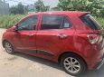 Hyundai Grand i10 2016 - Cần bán gấp Hyundai Grand i10 1.2 sản xuất 2016, màu đỏ, xe nhập xe gia đình, giá tốt