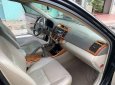 Toyota Camry 2003 - Cần bán gấp Toyota Camry đời 2003, màu đen số sàn, 258tr