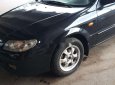 Mazda 323 2003 - Cần bán gấp Mazda 323 đời 2003, màu đen, nhập khẩu chính hãng