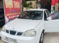 Daewoo Lacetti 2006 - Cần bán gấp Daewoo Lacetti đời 2006, màu trắng xe gia đình, giá 125tr, còn nguyên bản