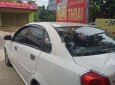 Daewoo Lacetti 2006 - Cần bán gấp Daewoo Lacetti đời 2006, màu trắng xe gia đình, giá 125tr, còn nguyên bản