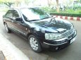 Ford Laser 2004 - Cần bán xe Ford Laser 1.8AT 2004, màu đen như mới giá tốt