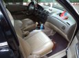 Ford Laser 2004 - Cần bán xe Ford Laser 1.8AT 2004, màu đen như mới giá tốt