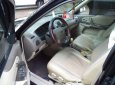 Ford Laser 2004 - Cần bán xe Ford Laser 1.8AT 2004, màu đen như mới giá tốt