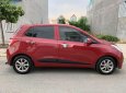 Hyundai Grand i10 2016 - Cần bán Hyundai Grand i10 1.2 đời 2016, màu đỏ, xe nhập xe gia đình