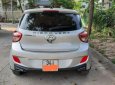 Hyundai Grand i10 2015 - Cần bán gấp Hyundai Grand i10 sản xuất năm 2015, màu trắng, xe nhập chính hãng