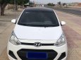 Hyundai Grand i10    MT 2014 - Cần bán Hyundai Grand i10 MT sản xuất 2014, màu trắng, nhập khẩu xe gia đình