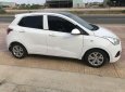 Hyundai Grand i10    MT 2014 - Cần bán Hyundai Grand i10 MT sản xuất 2014, màu trắng, nhập khẩu xe gia đình