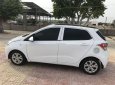 Hyundai Grand i10    MT 2014 - Cần bán Hyundai Grand i10 MT sản xuất 2014, màu trắng, nhập khẩu xe gia đình