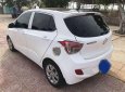 Hyundai Grand i10    MT 2014 - Cần bán Hyundai Grand i10 MT sản xuất 2014, màu trắng, nhập khẩu xe gia đình