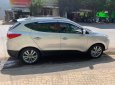 Hyundai Tucson   2011 - Bán Hyundai Tucson sản xuất năm 2011, màu bạc, xe nhập 