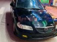 Mazda 626    2004 - Cần bán lại xe Mazda 626 sản xuất năm 2004, 215 triệu