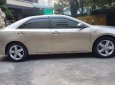 Toyota Camry   2014 - Bán Toyota Camry đời 2014, màu vàng, giá 850tr