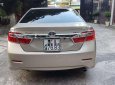 Toyota Camry   2014 - Bán Toyota Camry đời 2014, màu vàng, giá 850tr